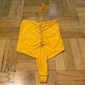 Silky bodysuit with cutouts